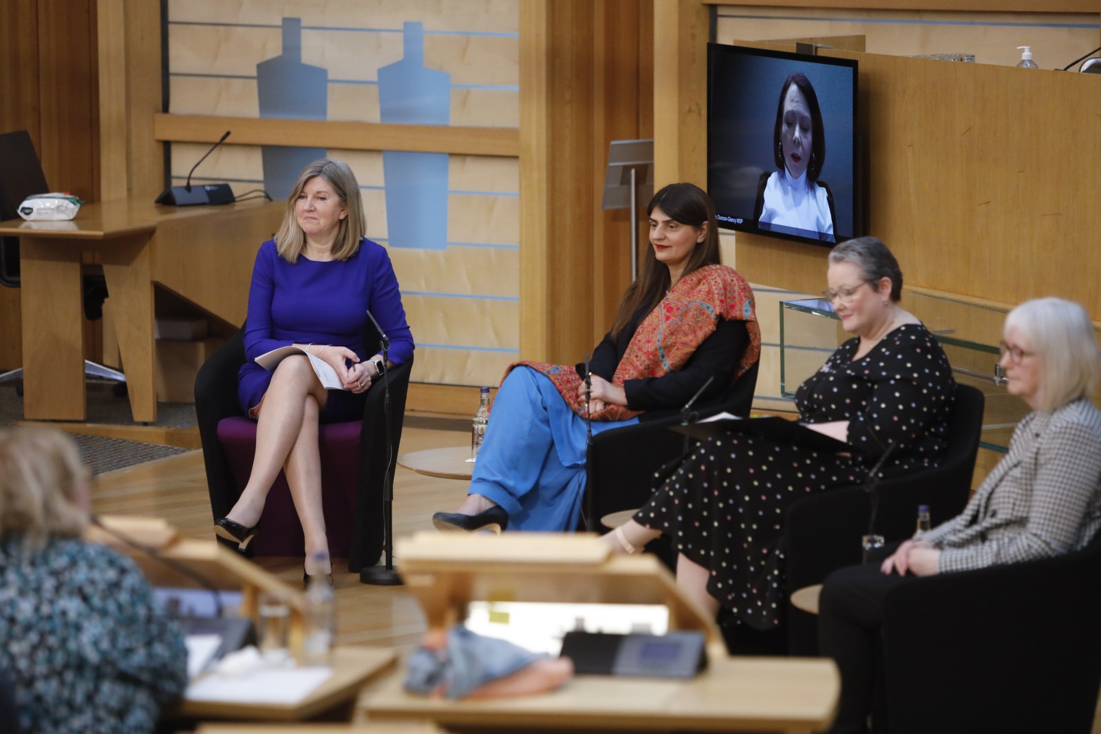 Presiding Officer Alison Johnstone MSP hosts a question and answer session with Pam Gosal MSP;Pam Duncan-Glancy MSP; Christina McKelvie MSP; and Beatrice Wishart MSP during the International Women's Day Conference held in the Debating Chamber of the Scottish Parliament. 05 March 2022.