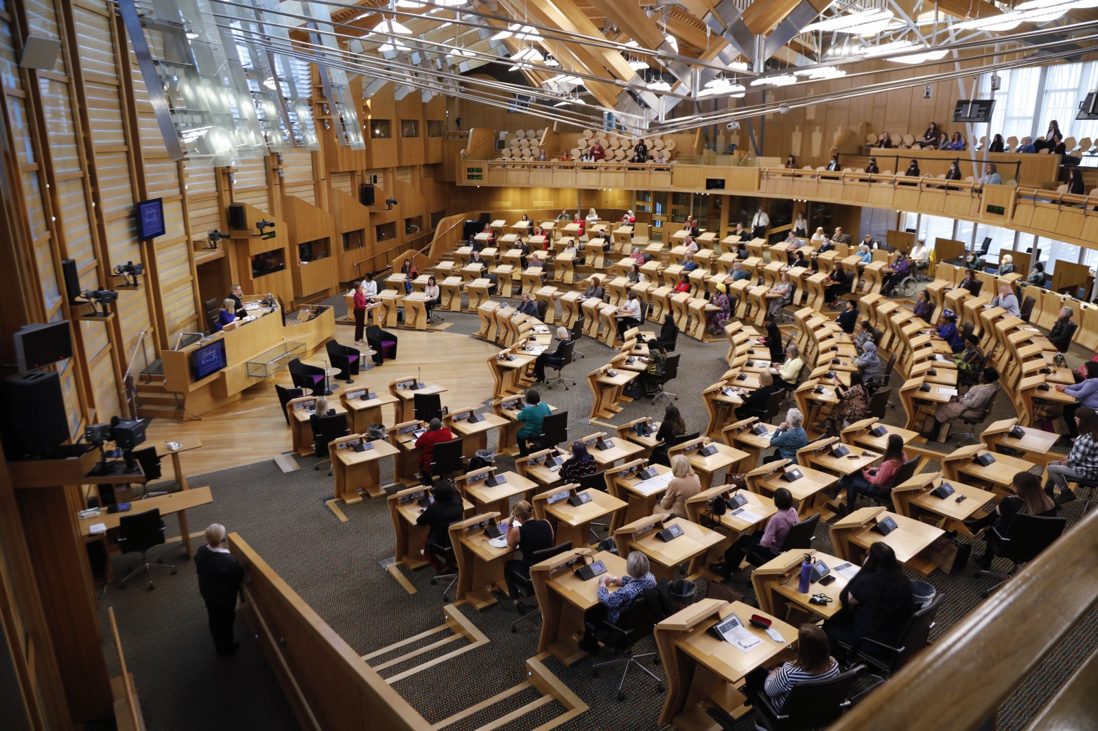 First Minister Nicola Sturgeon MSP pictured speaking during the International Women's Day Conference held in the Debating Chamber of the Scottish Parliament. 05 March 2022.