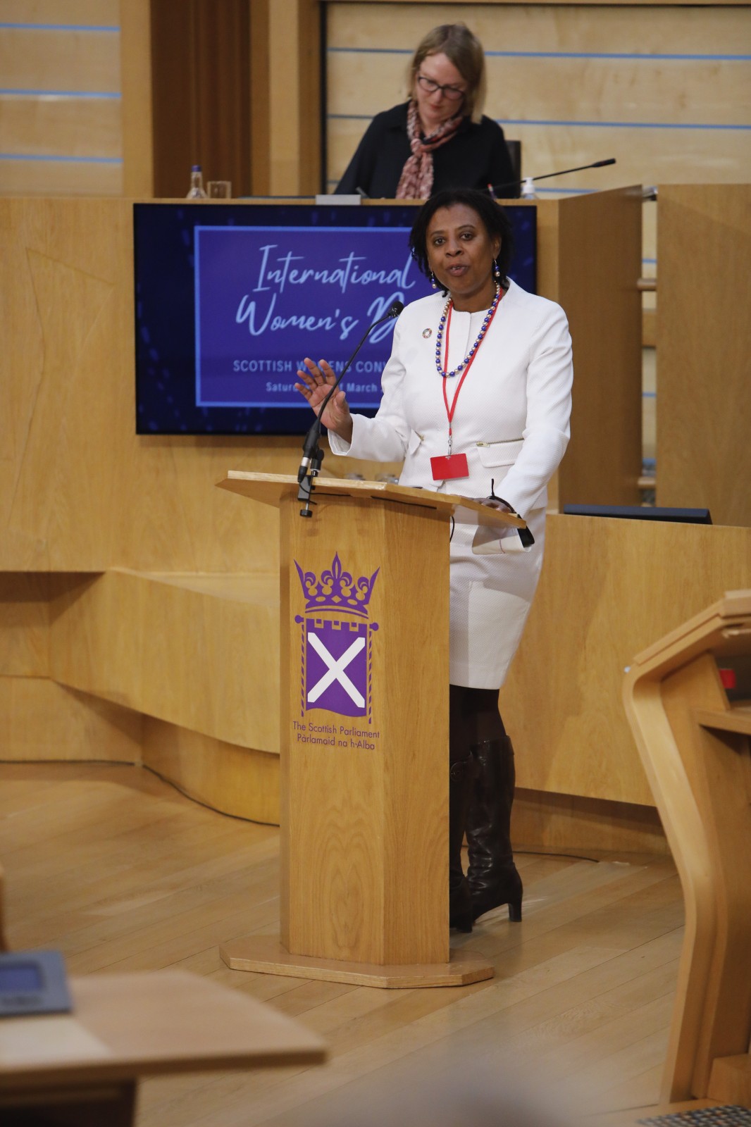 Brenda King MBE making her keynote address during the International Women's Day Conference held in the Debating Chamber of the Scottish Parliament. 05 March 2022.