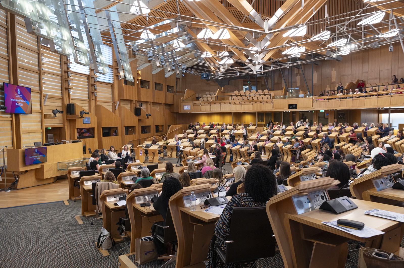 INTERNATIONAL WOMEN’S DAY – SATURDAY 2nd MARCH 2024In recognition of International Women’s Day, the Scottish Women’s Convention (SWC) and the Scottish Parliament celebrated Scottish Women Inspiring Inclusion through Human Rights.The event was chaired by Presiding Officer, Rt Hon. Alison Johnstone MSP. Contributions came from speakers including Shona Robison MSP, Deputy First Minister of Scotland and Cabinet Secretary for Finance, Julia Mattes and Maisi De Pellette, two school pupils from Our Lady’s High School in Cumbernauld; Mary Osie-Oppong, Secondary School Teacher and qualified Chartered Teacher and Chair of African Caribbean Women’s Association (ACWA) Glasgow; Jesimiel Rivas, a school pupil from Drumchapel High School, and entertainment journalist and presenter, Laura Boyd. The event also featured contributions from Emma Roddick MSP, Minister for Equalities, Migration and Refugees and singers Loryane McLucas and Ailish Culbertson.02/03/2024Photos Kirsty Anderson