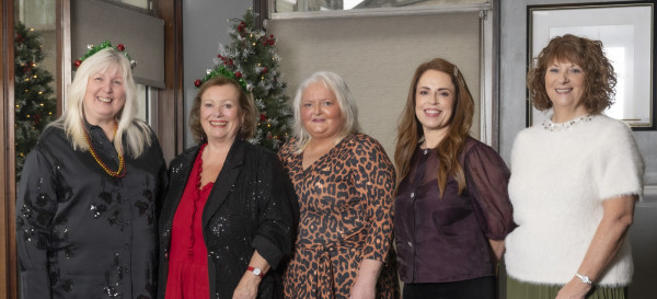 A group of women standing together.